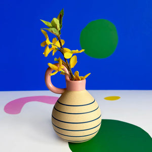 Back of the Bloc Vase revealing a continuation of the abstract design with soft brushstroke textures and a focus on muted blue and mustard elements.