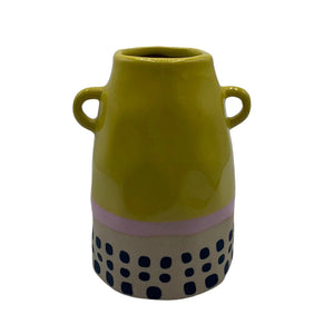 Styled Bloc Yellow Vase on colourful backdrop with soft pink and blue accents.