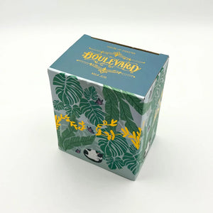 Fully printed Boulevard Cat Jug gift box with matching leaf and cat illustrations in green, yellow, and purple tones.