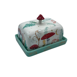 Studio image of the Forage Butter Dish set against a white background, clearly showing mushroom, moon, and fern detailing on lid and tray.