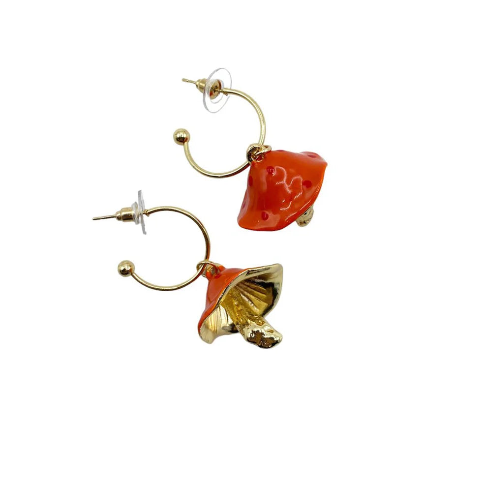 Isolated product shot of Forage Red Earrings, showing one front view and one angled underside view with shimmering golden gills and curved mushroom design.