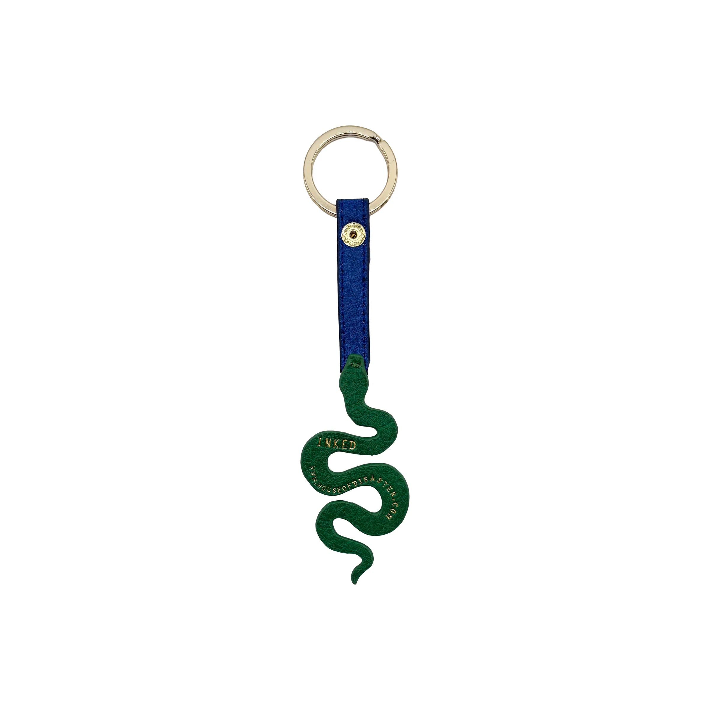 Back view of snake keyring showing plain green PVC with “INKED” branding and blue vegan strap detail.