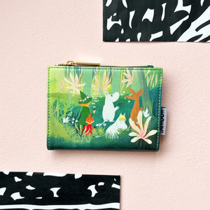 Front of the Moomin Forest Purse showing colourful characters in a forest scene with lush green foliage and pink flowers.