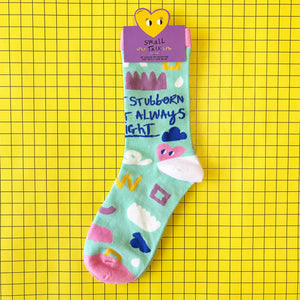 Single sock with packaging label “Small Talk” showing slogan and quirky design on bamboo blend material.