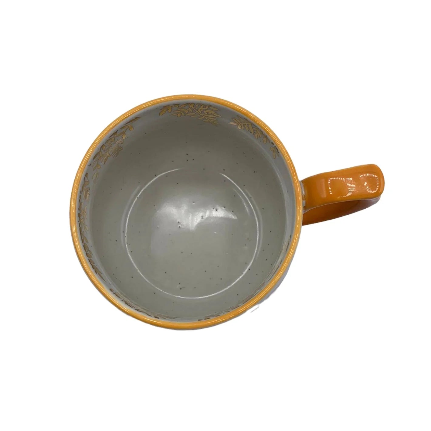 Top-down view of Posy Orange Mug – interior detail of gold foil botanical print against soft speckled ceramic.
