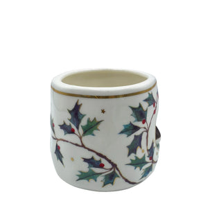 Back view of robin mug showcasing continuous holly and berry illustration with gold star detail.
