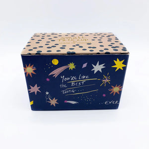 Gift box packaging for “You’re like the best thing” mug by House of Disaster, with star design and spotty lid.