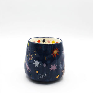 Back of mug showing full celestial starry night pattern with colourful stars and comets.