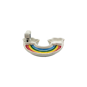 A product shot of the Peanuts Rainbow Trinket Dish against a white background, highlighting its gold-rimmed cloud-shaped compartments and vibrant rainbow colours.