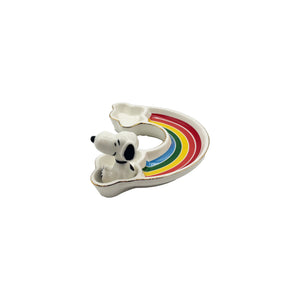 A side-angle view of the Snoopy Rainbow Trinket Dish, showing the 3D Snoopy figure and detailed gold-lined edges.