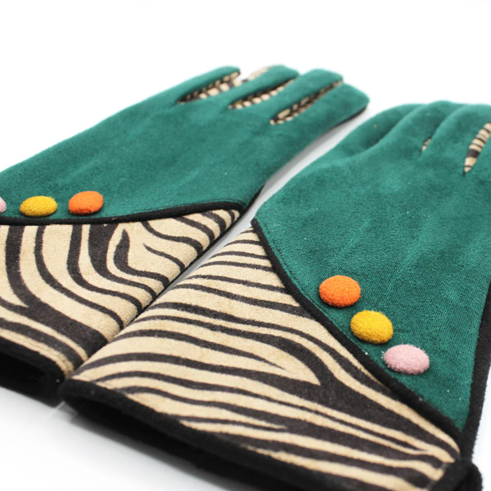 Close-up of zebra fashion gloves highlighting zebra stripe pattern, green fabric, and colourful fabric-covered buttons.