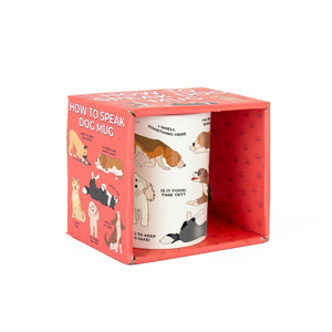 Angled side view of the How to Speak Dog Mug inside a red paw-print patterned gift box, featuring cute cartoon dog illustrations and humorous behavioural captions.