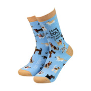 Light blue women’s bamboo socks with dog print and text “I love dogs and maybe 3 people” by Sock Therapy – sustainable, soft, and fun dog lover gift.