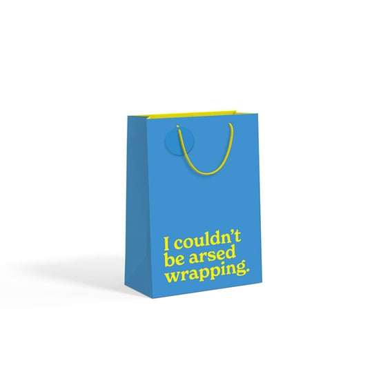 Teal blue medium gift bag with gold slogan text on white background.