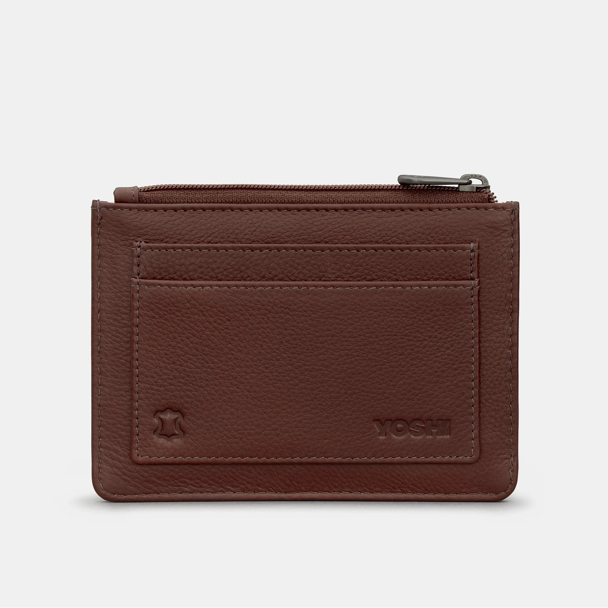 Back view of Yoshi Into the Wild brown leather purse showing card slots and embossed logo.