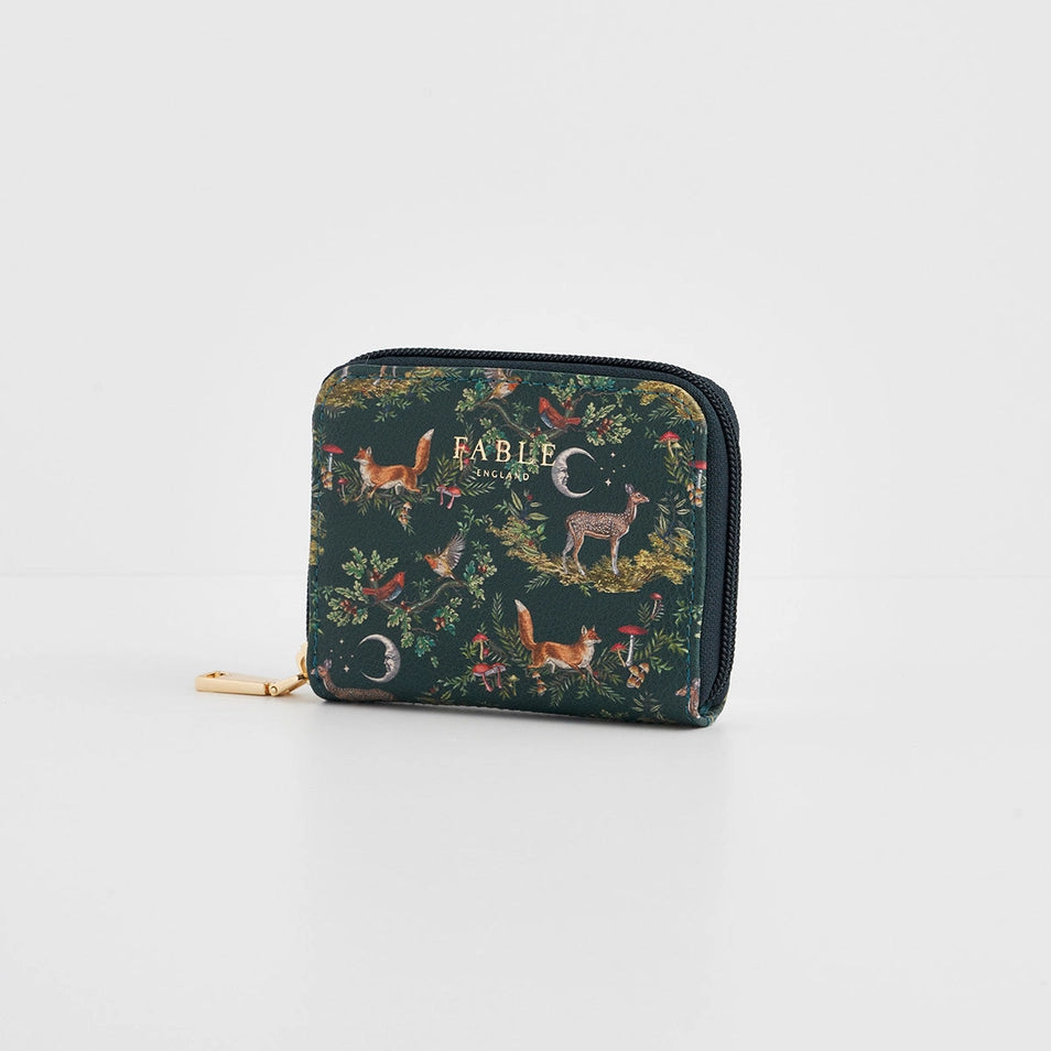 Side angle of Into the Woods Green Small Purse showing gold zip detail.