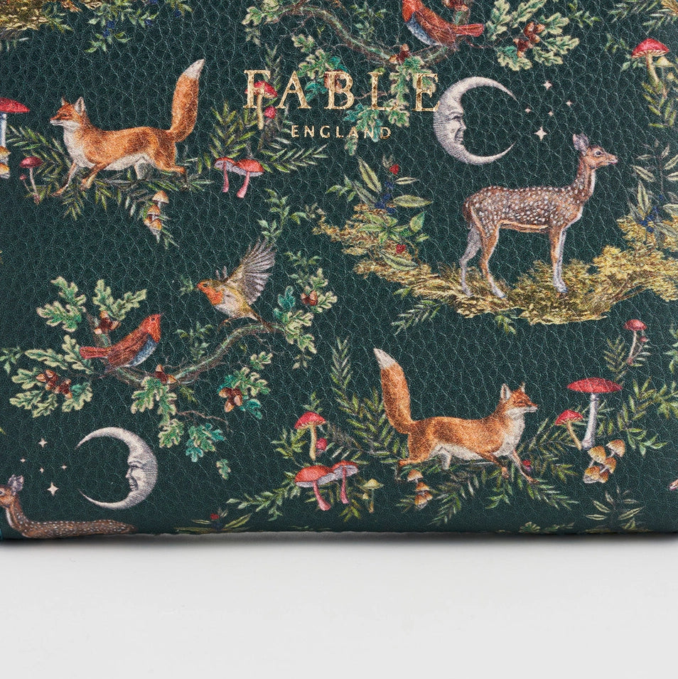Close-up detail of woodland animal pattern on Into the Woods Green Small Purse.