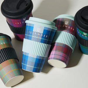 Imagine a group of six Islander Bamboo Travel Cups, displayed side-by-side. Each cup is made from sustainable bamboo and features a secure lid.