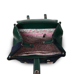 Inside the Jura backpack  showing the internal pocket and the floral lining. 