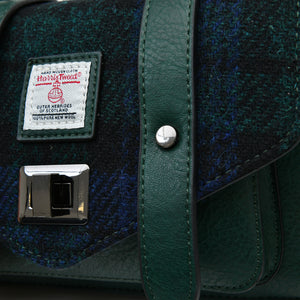 Close up of the Harris Tweed pattern of the satchel. 