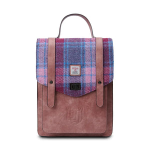 A pink and blue tartan Islander Carloway backpack against a white background.