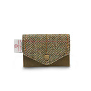 Front view of Islander Chestnut Herringbone Harris Tweed Card Holder with green leather base, classic tweed flap, metal crest, and official Harris Tweed tag.
