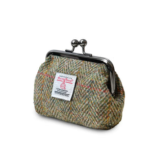 Side image of the Chestnut Herringbone Harris Tweed Coin Purse showing the depth of the purse and the clasp closer.