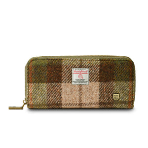 Ladies Harris Tweed purse in a green and brown tartan pattern and with the zip to the side.