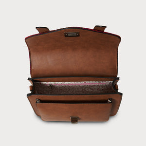 Interior view of Fuchsia Red Tartan Harris Tweed® satchel showing floral lining and compartments.