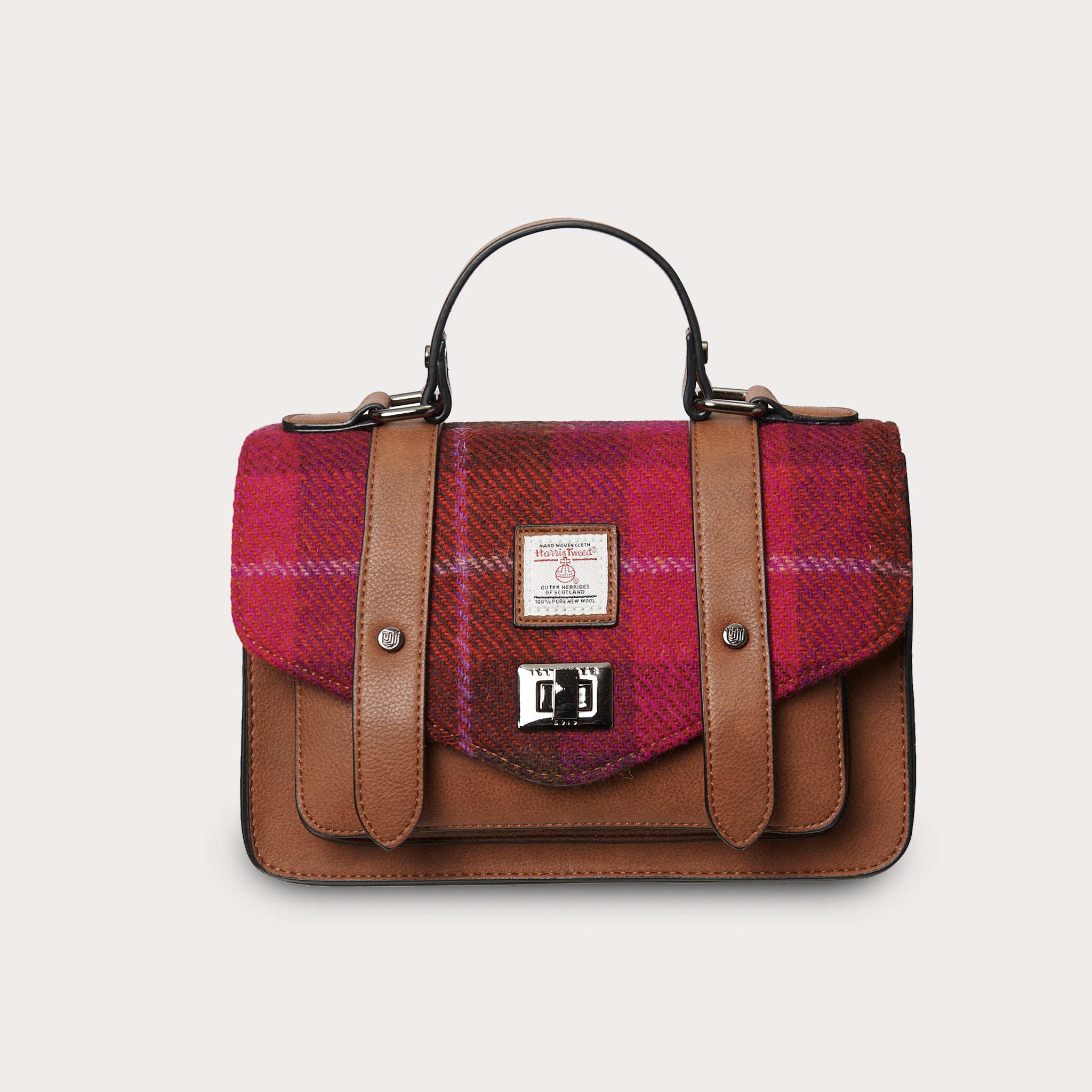 Front view of Fuchsia Red Tartan Medium Satchel with Harris Tweed® and tan leather straps.