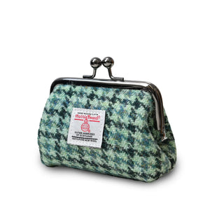Side view of the Harris Tweed Green Dogtooth patterned coin purse.