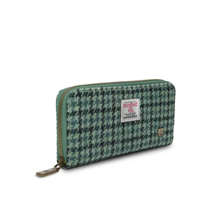 Side angle of the Islander Green Dogtooth Harris Tweed Zip Purse showing the width.