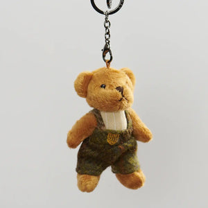 A brown Harris Tweed Islander Bear Keyring, featuring a classic tartan pattern and a soft, plush design.