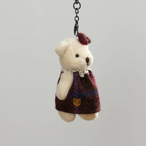 A red Harris Tweed Islander Bear Keyring, a vibrant and eye-catching accessory.