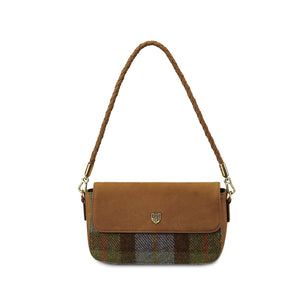 Front view of the Islander Caithness Harris Tweed Clutch Bag in chestnut leather with blue tartan detail, featuring a braided strap.