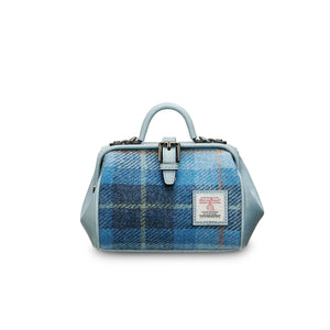 A stylish mini doctor bag crafted from blue tartan Harris Tweed, featuring two top handles for versatile carrying. (Islander)