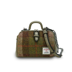 A stylish mini doctor bag in a rich chestnut tartan Harris Tweed, featuring two top handles and a detachable shoulder strap resting on top of the bag. (Islander)