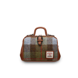 A classic mini doctor bag crafted from a timeless chestnut and blue tartan Harris Tweed, showcasing two top handles for versatile carrying. Presented on a clean white background. (Islander)