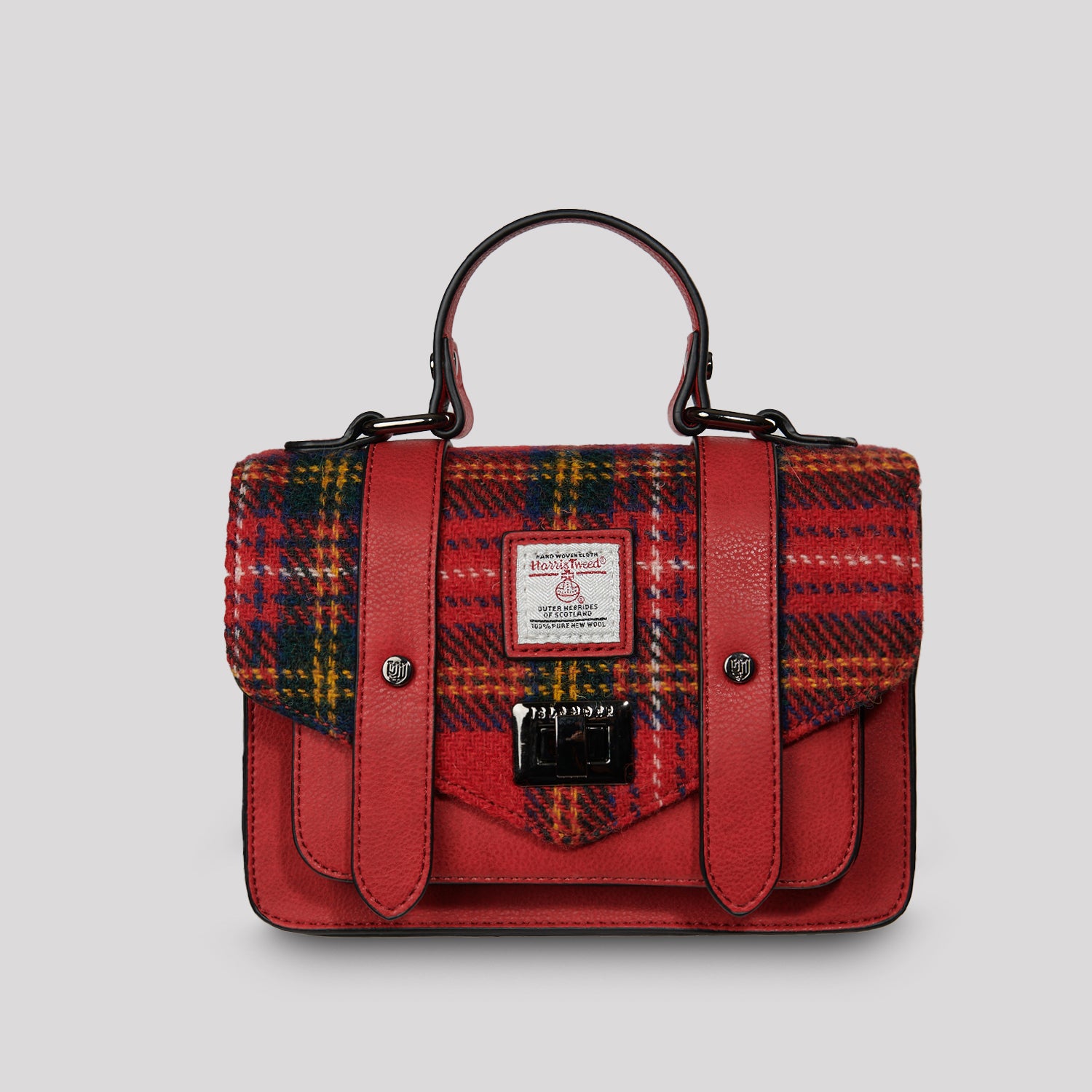 Mini Islander satchel in Royal Stewart Tartan with red leather detailing and top handle.