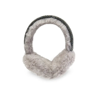 Side view of a pair of Harris Tweed earmuffs, showcasing their warm and cozy interior.