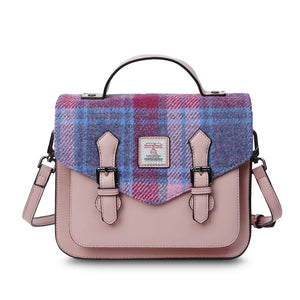 A vibrant pink and blue tartan Harris Tweed satchel bag, adding a playful touch to any outfit.
