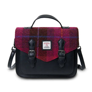 A bold red tartan Harris Tweed satchel bag, making a striking statement.