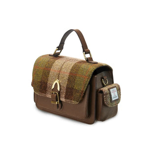 A side view of a chestnut tartan Harris Tweed Melrose Leather Crossbody Bag. It has a spacious interior and a sturdy top handle.