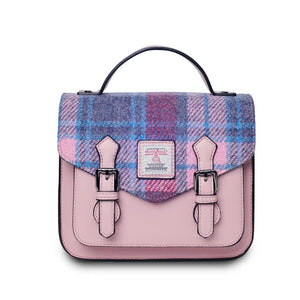 A front view of a pink and blue tartan Harris Tweed Mini Calton Satchel, highlighting its authentic Harris Tweed® panel and metal chain strap.