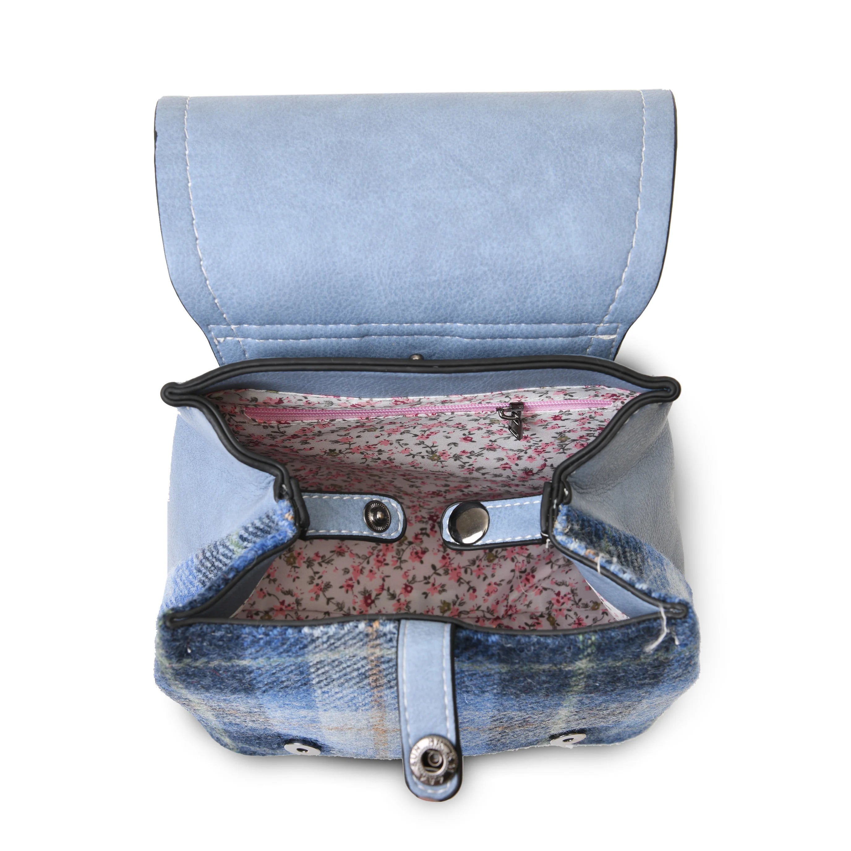 Mini Jura backpack interior showing pink floral lining and zip pocket