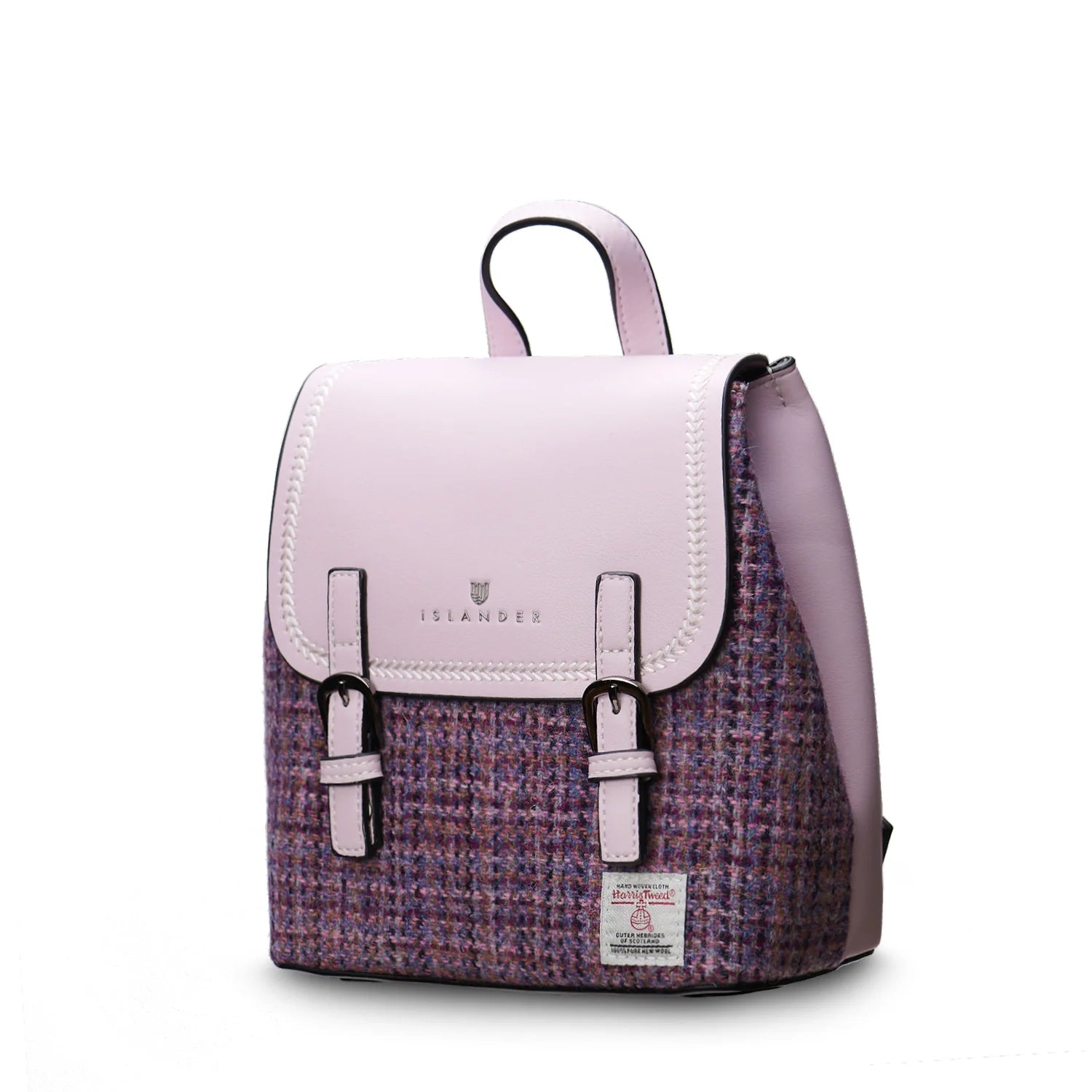 Mini Jura backpack angled view showing depth and Islander logo on white