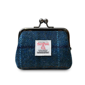 Harris Tweed coin purse in a navy blue tartan check pattern with a metal clasp closer.