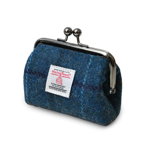 Side angle of the Islander Navy Over-Check Harris Tweed Coin Purse showing the depth.