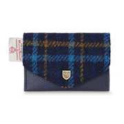 Navy tartan Harris Tweed® card holder with blue leather body and gold snap closure by Islander.
