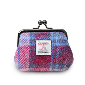 Ladies coin purse in a pink and blue tartan Harris Tweed fabric and a metal clasp closer.